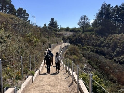 People walking on the new Bay Area Ridge Trail segment.