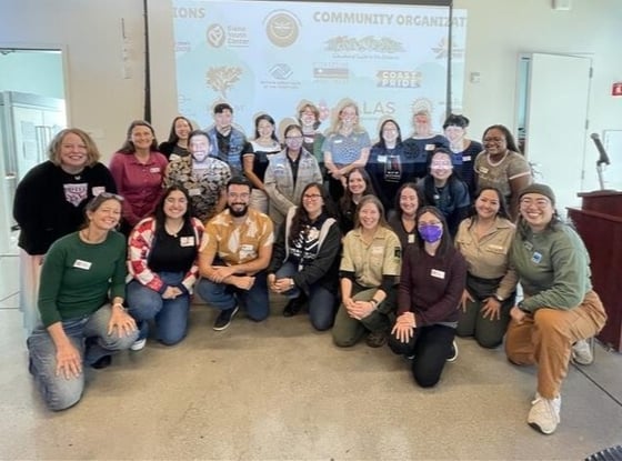 Group of park agency and nonprofit staff pose for photo
