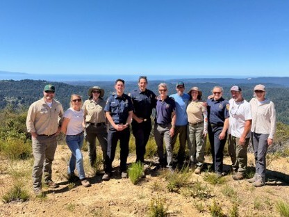 An outdoor group photo with representatives of the Los Gatos Creek Watershed Collaborative.