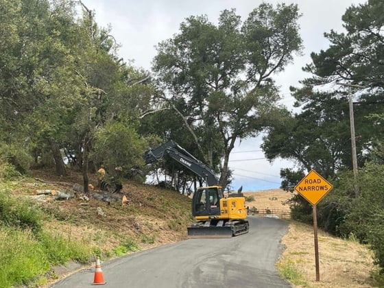 A tractor being operated on Sears Ranch Road to create a fuel break. 